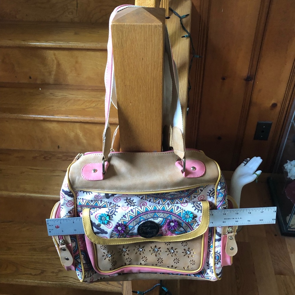 Falcony brand vegan pocketbook.